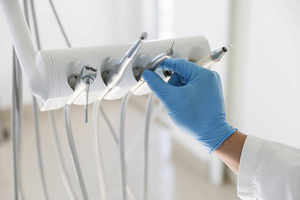 Professional Emergency Dentist technician working in Ferry Pass, FL